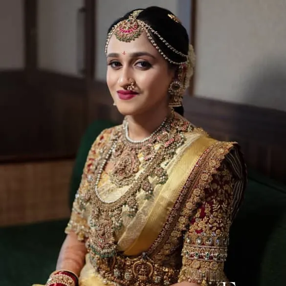 This is the quintessential South Indian bridal look that forms the heart of my training. You will learn how to create this flawless, radiant makeup that complements heavy silk sarees and traditional gold jewelry, ensuring your brides look timeless.