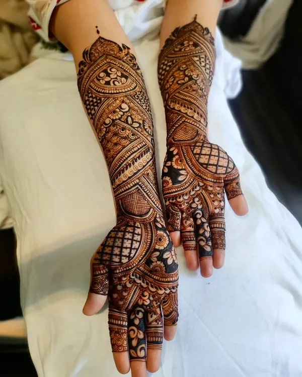 A perfect example of a full Indian bridal design, showcasing the balance and density we work towards in the advanced course.