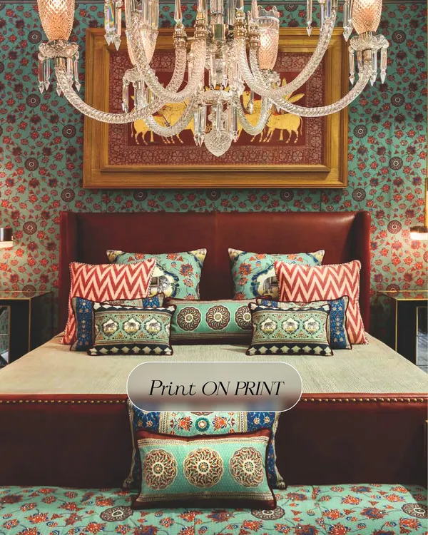 This bedroom is a masterclass in maximalism. The walls are covered in a busy floral pattern, which serves as a backdrop for more patterns on the pillows and a traditional painting, creating a rich, layered look.