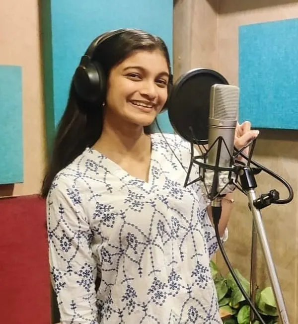 A smile of pure satisfaction after a great take. Being in the recording booth, with headphones on and the mic ready, is a feeling like no other. This was for a devotional track, and I felt truly blessed.