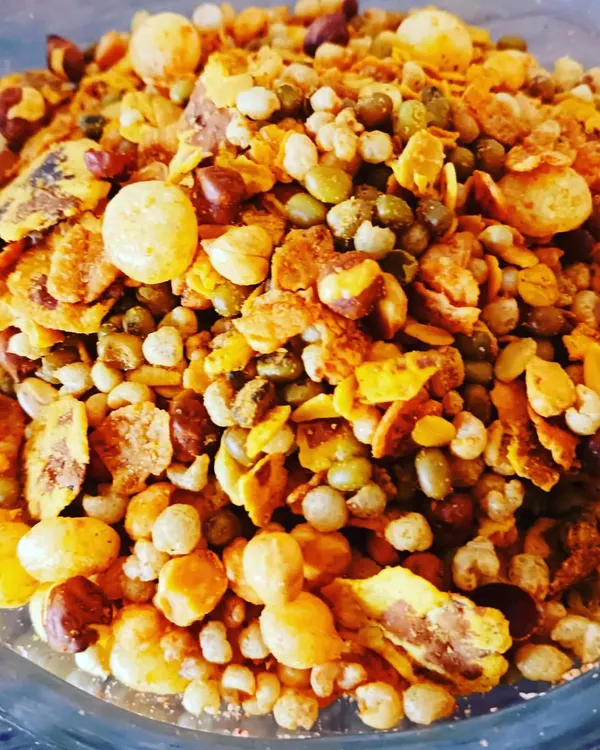 A crunchy and savory roasted mixture of grains, lentils, and cornflakes. A healthy, high-protein snack.