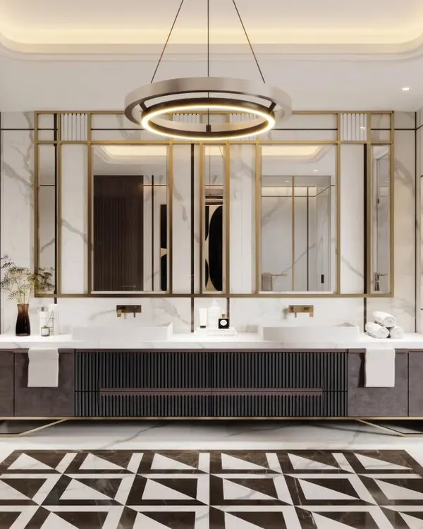 This bathroom render showcases a grand, symmetrical vanity with dual sinks, framed by gold-accented mirrors. We've focused on the geometric floor pattern and the statement circular chandelier to create a feeling of modern opulence.