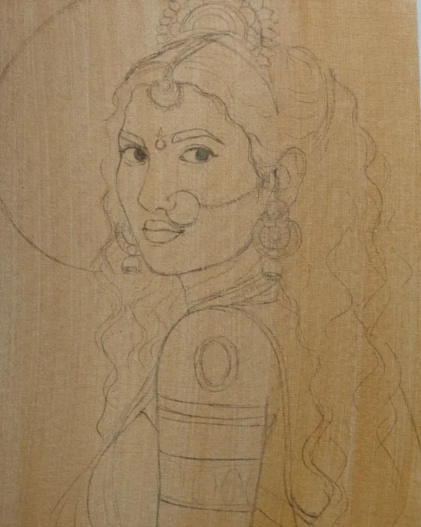 The journey of my Maa Durga painting begins with a detailed pencil sketch on canvas. This foundational drawing maps out the composition, expression, and intricate details of her jewelry and crown before I apply any paint.