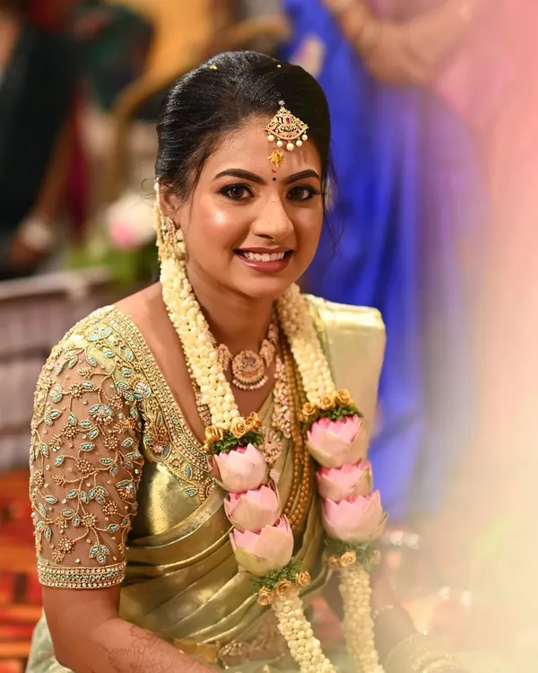 A happy, natural smile from my client on her ring ceremony day. The makeup is designed to enhance her features for a fresh and radiant look.