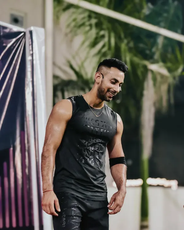 The reward for work well done is the opportunity to do more. A candid, smiling shot after a tough workout. Feeling grateful and ready for the next challenge.
