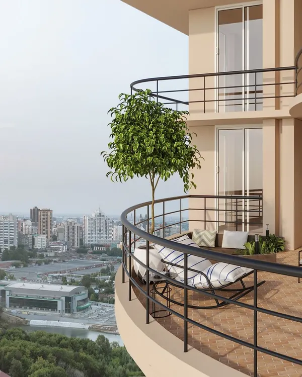 This expansive wrap-around balcony offers stunning city views. I designed it with multiple seating areas, including a comfortable rocking chair, to create different zones for relaxation and enjoying the outdoors.