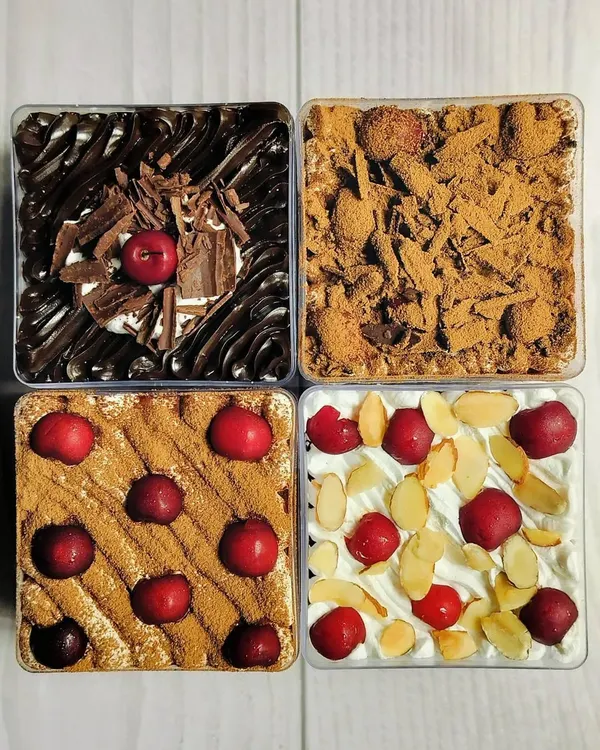 When cherries are in season, I create an entire range of Cherry Dessert Tubs. This assortment includes Chocolate Cherry Cheesecake, Black Forest Tres Leches, Cherry Almond Tiramisu, and Cherry Almond Tres Leches.