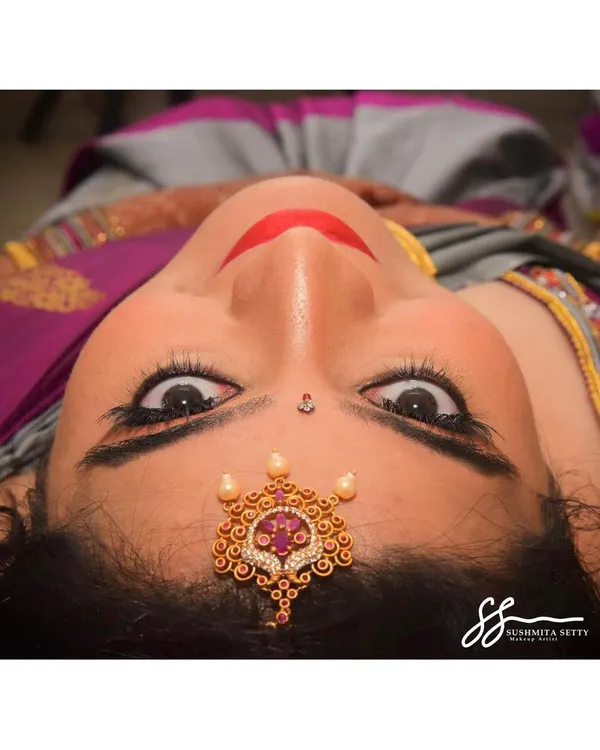This is the kind of detail I love to create. For this gorgeous engagement look, I focused on flawless skin, a classic red lip, and dramatic, long lashes that really make the eyes pop.