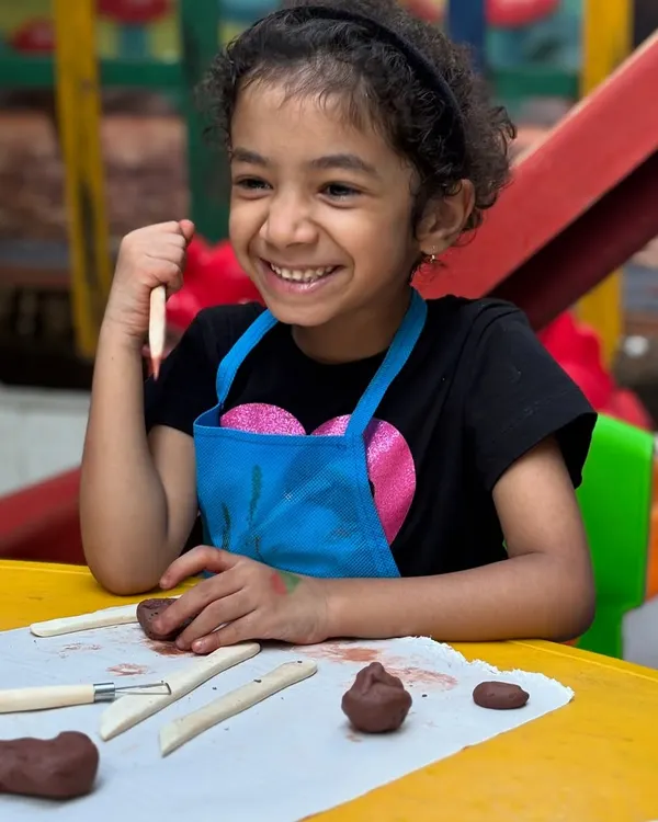 This radiant smile says it all. My classes are a space for pure joy and creative exploration, where children feel happy and free to be themselves while learning through tactile play with terracotta clay.
