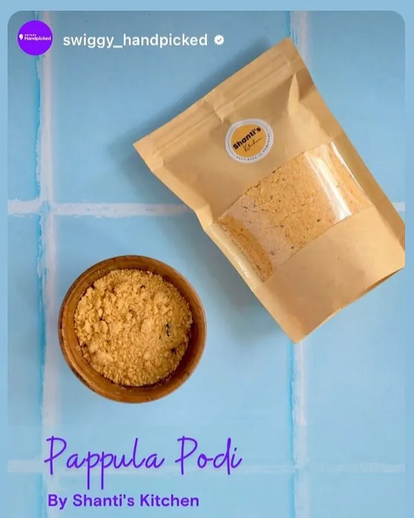 My Pappula Podi, also known as fried gram powder, is a classic South Indian staple. Here you can see its fine, flavourful texture in a bowl, ready to be enjoyed. The resealable packaging keeps it fresh in your pantry.