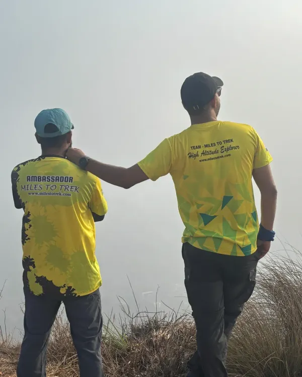 Our trek leaders looking out over the mountains. We are a team of passionate and certified professionals dedicated to providing safe and inspiring outdoor experiences.