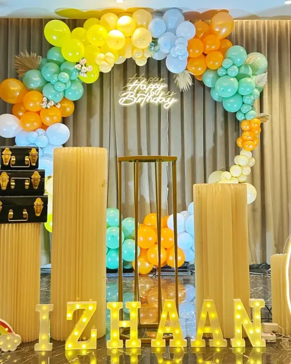 A cute and colorful dinosaur theme for Izhaan's 6th birthday, with friendly dino cutouts and a vibrant balloon ring.