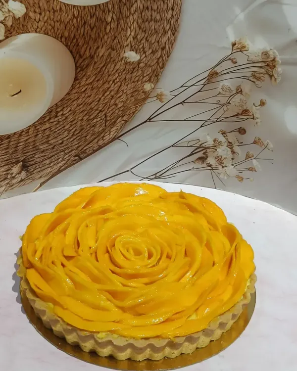 This is my ode to the king of fruits. A crisp, buttery tart shell filled with delicate pastry cream and topped with a rose of fresh, sweet mango slices. It’s a celebration of mango season in every single bite.