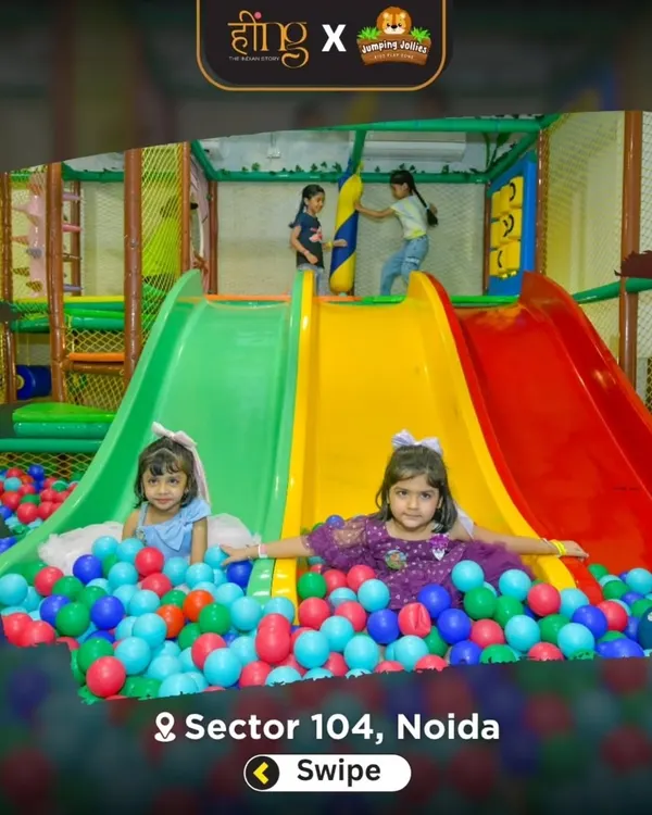 Welcome to Jumping Jollies, where the fun never stops. I designed this space so kids can have the time of their lives, like these two friends making a splash in our giant ball pit after racing down the slides.