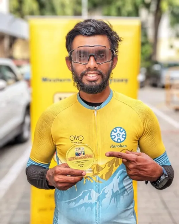The spirit of our community is captured in rides like the Western Ghats Odyssey, a 1500km race with 19,000 meters of elevation. Here, a finisher proudly displays his trophy after conquering extreme weather and terrain to secure 4th place.