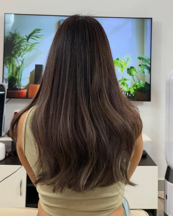 A color correction transformation. I neutralized unwanted warm tones and evened out the color to create this beautiful, cool-toned result with subtle highlights.