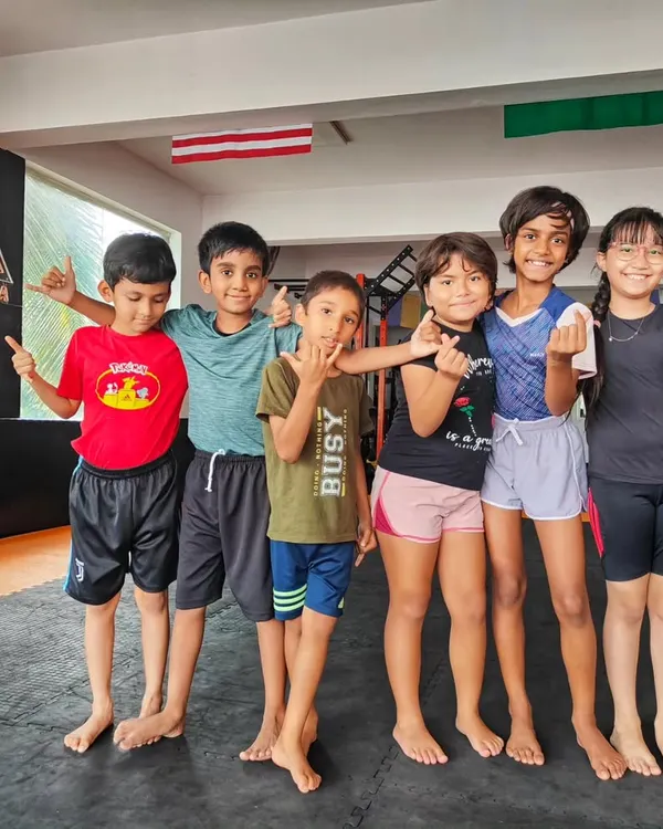 A happy crew of our young Jiu-Jitsu practitioners. Our classes for kids focus on building a strong foundation in grappling through fun, interactive exercises that teach discipline and teamwork.