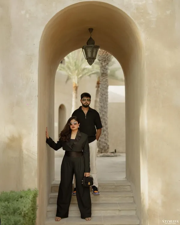 A powerful, fashion-inspired portrait taken under the arches of Al Seef, Dubai. The composition and styling create a look that feels like it's straight from a magazine cover.