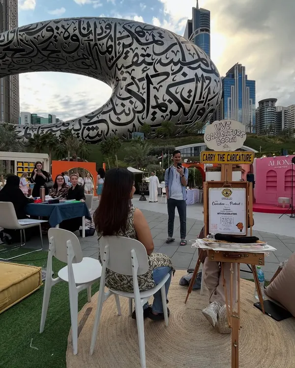 My office view in Dubai, with the stunning Museum of the Future in the background. What an incredible place to be creating art.