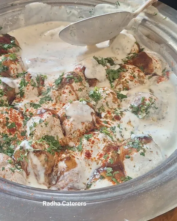 Our Dahi Vada is the perfect balance of sweet, savory, and tangy. It's a light yet satisfying starter for any party.