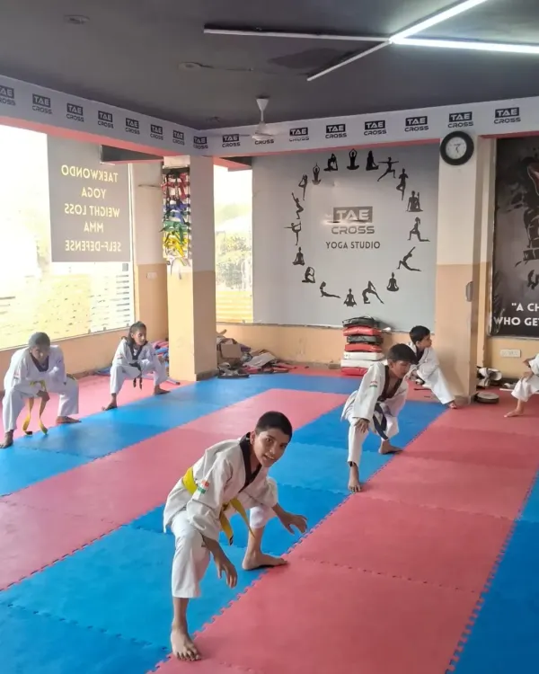 Mastering the basics is essential. Our young students practice their foundational stances, building the stability and power needed for all Taekwondo movements.