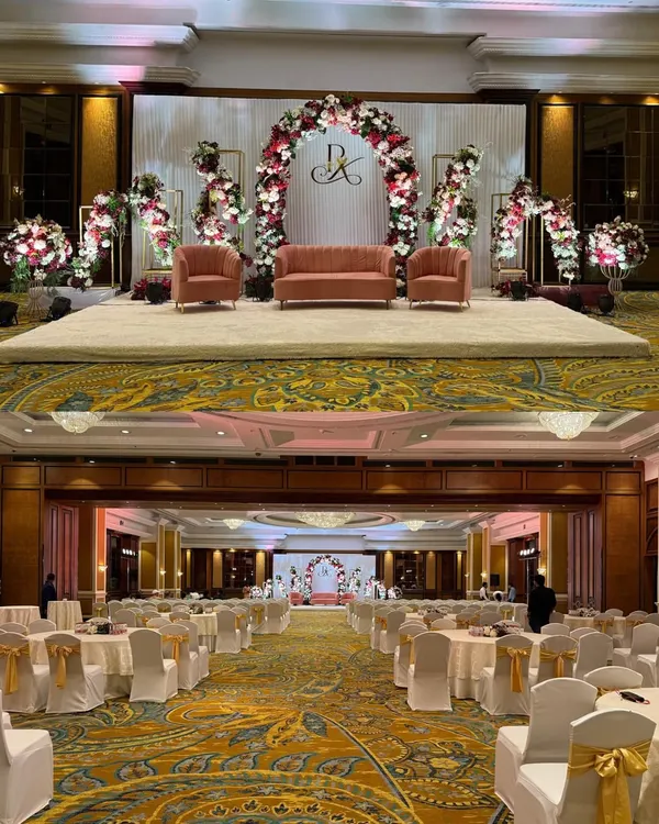 This split-view shows how I can transform a grand ballroom. The top image displays a custom-designed stage with lush floral arches, perfect for an awards ceremony, while the bottom view reveals the full venue layout, ensuring a cohesive and impressive experience for all attendees.