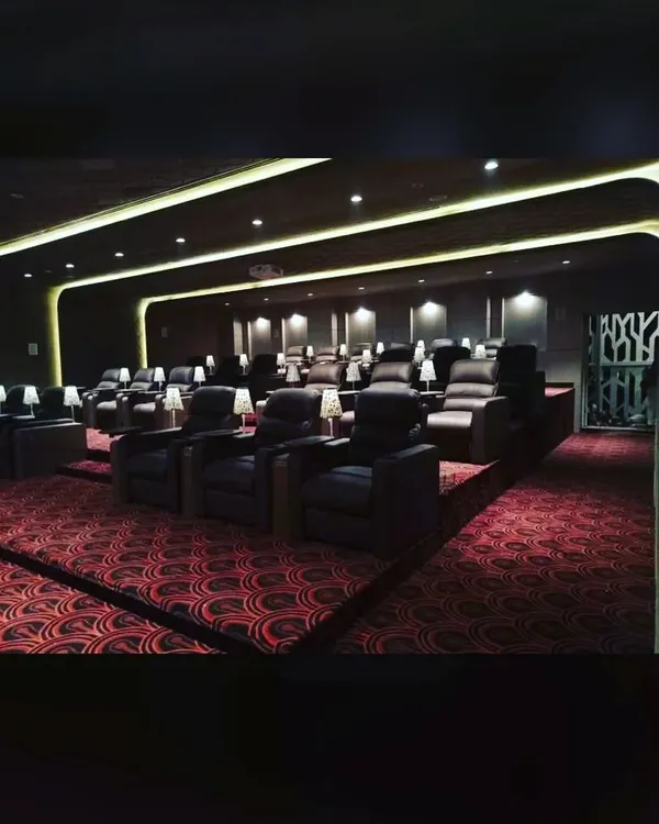 This is the dream of a personal cinema, brought to life. We designed this dedicated home theater with multi-level recliner seating, professional acoustic treatment, and carefully calibrated lighting to create the ultimate, distraction-free movie-watching experience.