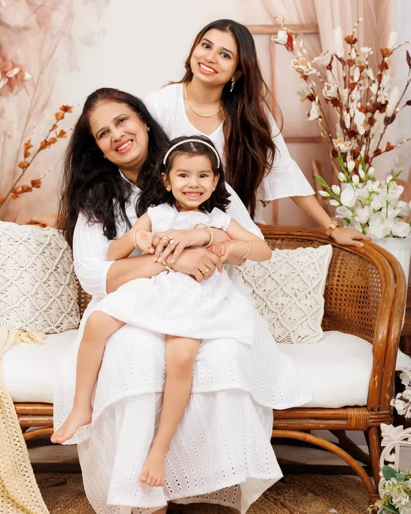 Three generations of love. This beautiful portrait of a grandmother, mother, and daughter in our bohemian setup is a timeless keepsake.