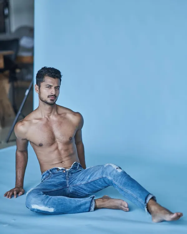 A shot from a professional studio session. The confidence to be in front of a camera is built day by day in the gym.