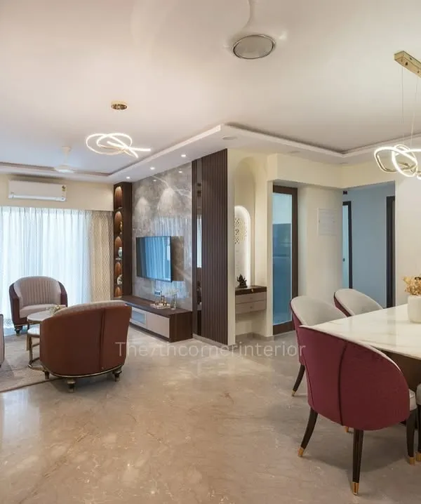 I believe a home should be a sanctuary of modern luxury and comfort. This living and dining area from my Elysian Enclave project in Borivali showcases this philosophy, blending sophisticated elements, clean lines, and uncluttered spaces to create an environment that nurtures the soul.