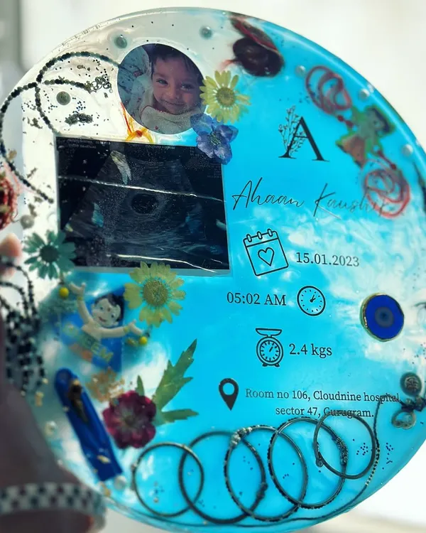 This custom baby details frame holds so much love. I preserved this little one's sonogram, first photo, birth details, and even their tiny silver bangles in a beautiful resin keepsake for the family to treasure.