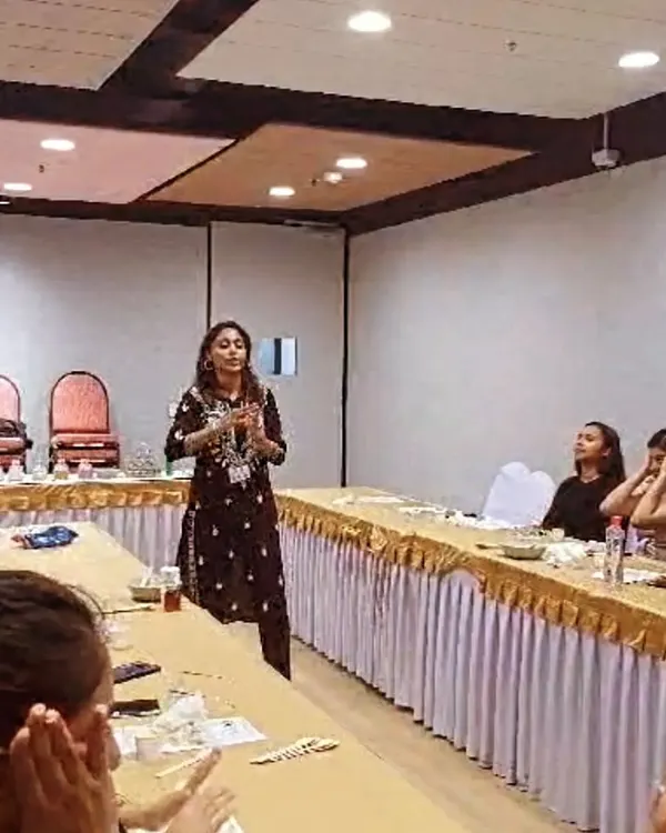 Leading a unique corporate wellness session on Face Yoga and the power of natural ingredients for healthy, glowing skin.