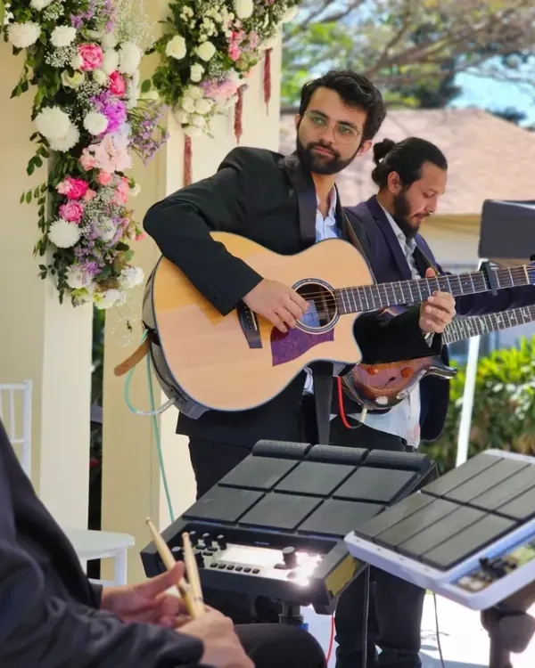 Here’s a look at the full band setup for a recent wedding event. We bring a professional and polished performance, complete with guitars, keys, and percussion, to make your celebration unforgettable.