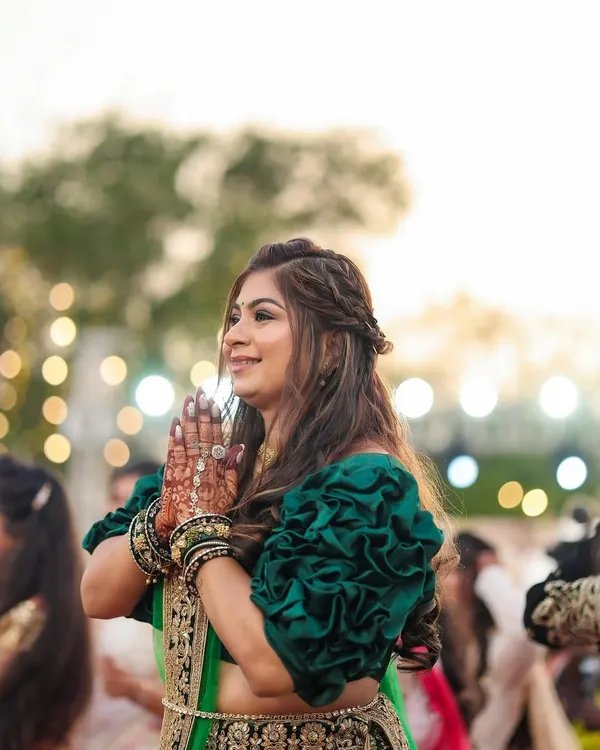 A beautiful candid of a wedding guest. I gave her a soft, natural glam look with a simple half-up hairstyle that was perfect for the daytime ceremony.
