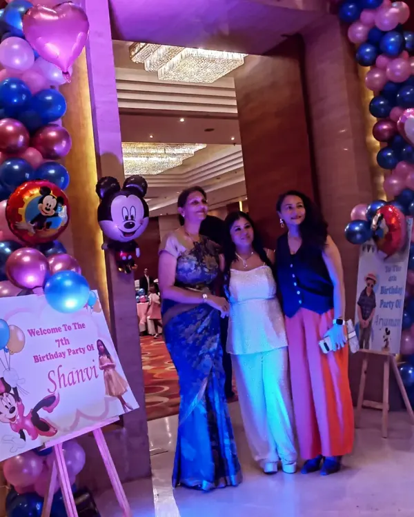 A custom welcome sign and balloon arrangement at the entrance of a Mickey and Minnie themed birthday party. I ensure every detail, from the entrance to the stage, matches your chosen theme.