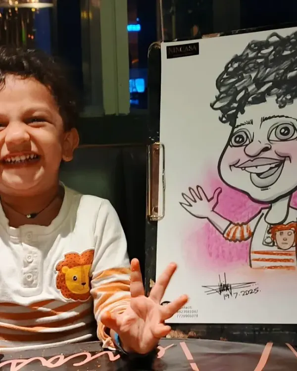 The pure joy on a child's face when they see their caricature for the first time is why I love what I do. This moment captures the fun and magic I bring to any party or event.