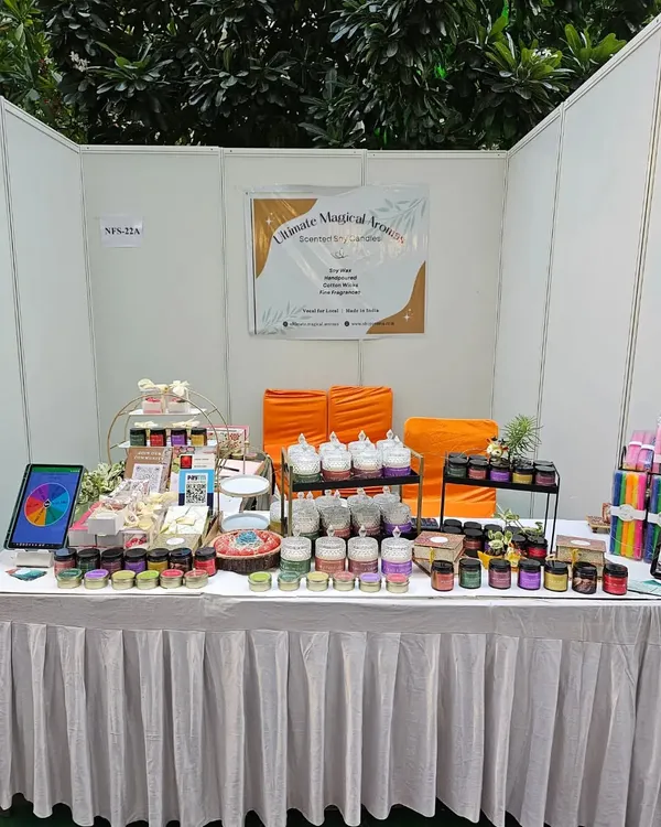 My full stall setup at a local exhibition. This shows the wide range of products I offer, from jar and tin candles to wax melts and festive items, all available for bulk and custom orders.