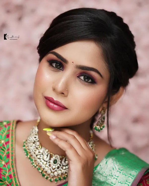 This is the level of artistry you will learn to achieve. This close-up from a live class demonstration shows a modern South-Indian bridal look with a focus on blended eyeshadow, defined brows, and a radiant skin finish.