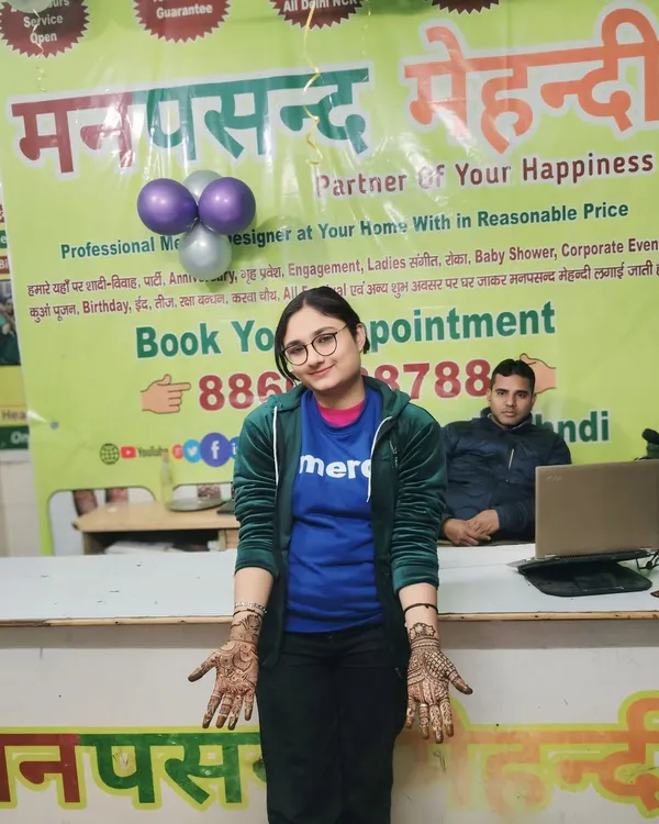 A happy client at our free New Year mehndi camp. We love starting the year by bringing smiles to our customers' faces.