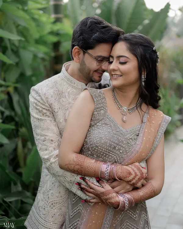 A close-up, intimate portrait capturing the genuine smiles and connection between the couple during their outdoor engagement shoot.