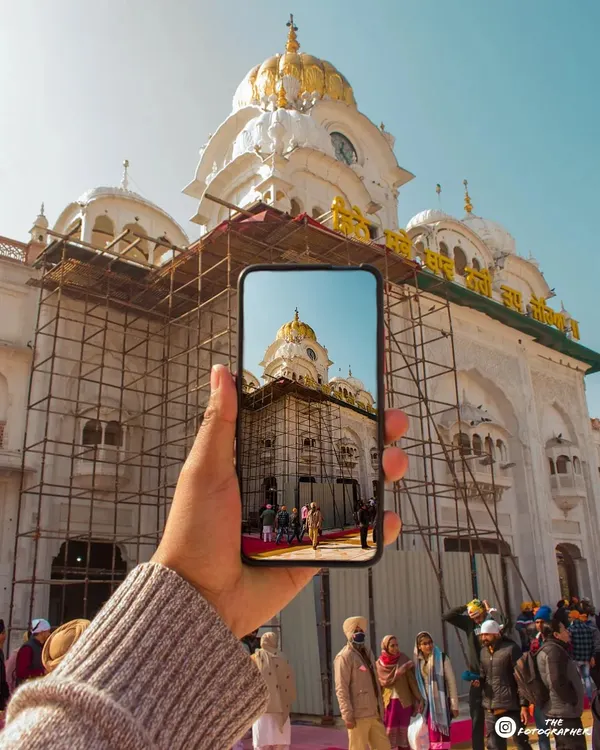Instead of a typical shot of the Golden Temple, I wanted to try something different. Using a phone to frame the shot creates a picture within a picture, showing how we see and capture these beautiful places today.