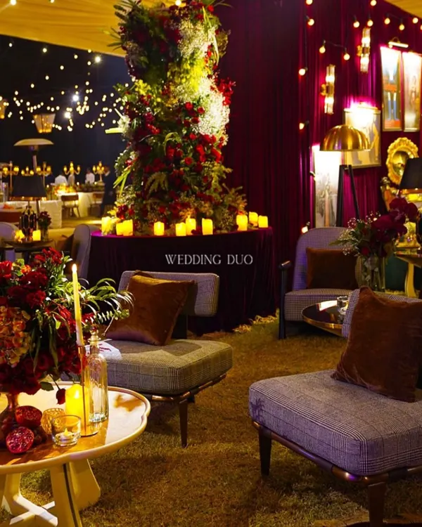 A glimpse into our Speakeasy Sangeet, where moody lighting, deep red florals, and plush lounge seating created a timeless and intimate vibe. Even a bit of rain couldn't dampen the magic of this candlelit evening.