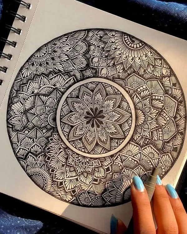 It all started with a pen and paper. This is a throwback to my early sketchbook drawings, where I first discovered the calming process of creating mandalas.