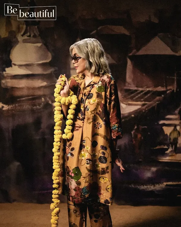 A beautiful shot from the Be Beautiful editorial, where we used a painted backdrop and marigolds to create a rich, artistic mood.
