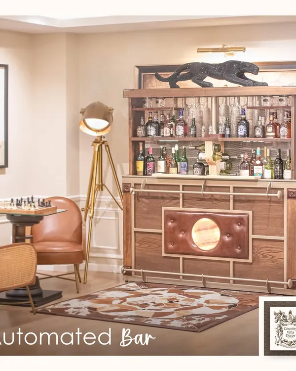 This is the Matryoshka, my latest automated bar design. It combines rich wood, leather paneling, and an illuminated onyx feature to create a truly luxurious and state-of-the-art home bar experience.