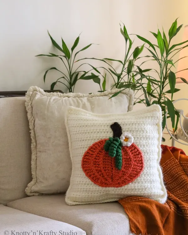 A simple touch of autumn for my home. This pumpkin applique cushion brings instant coziness to this neutral-toned sofa.
