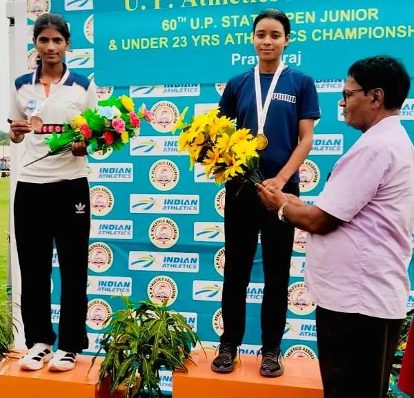 On the podium at the 60th U.P. State Open Junior Athletics Championships. Our athlete stands proud after securing her medal, a result of pure dedication and hard work.