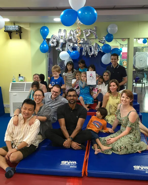 The perfect end to a perfect party. A group photo with kids, parents, and our instructors celebrating Elisa's birthday. Look at all those smiles!
