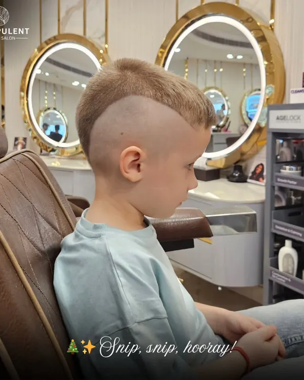 Snip, snip, hooray. Getting this little guy ready for the holidays with a super cool and edgy haircut. Style starts young.