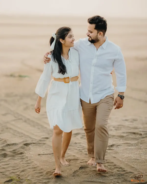 A simple, happy walk on the beach for Milan and Pranali. These casual, unposed moments during a pre-wedding shoot often feel the most authentic.